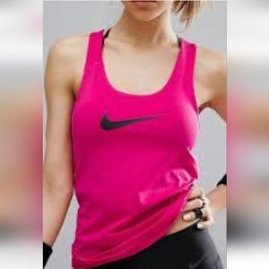 Nike Pro Dri-Fit athletic tank top in pink magenta. Nike swoosh logo. Size L